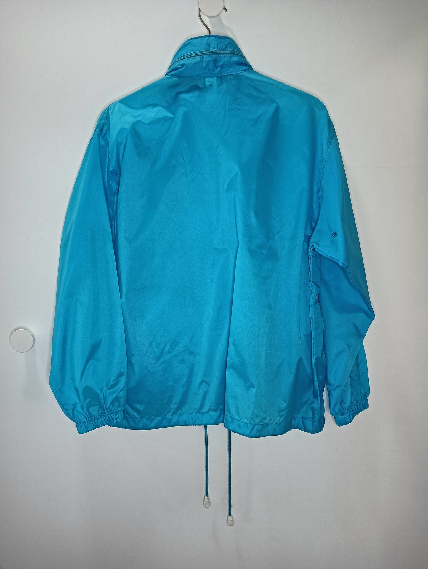 Corta viento Celeste Quad Girl